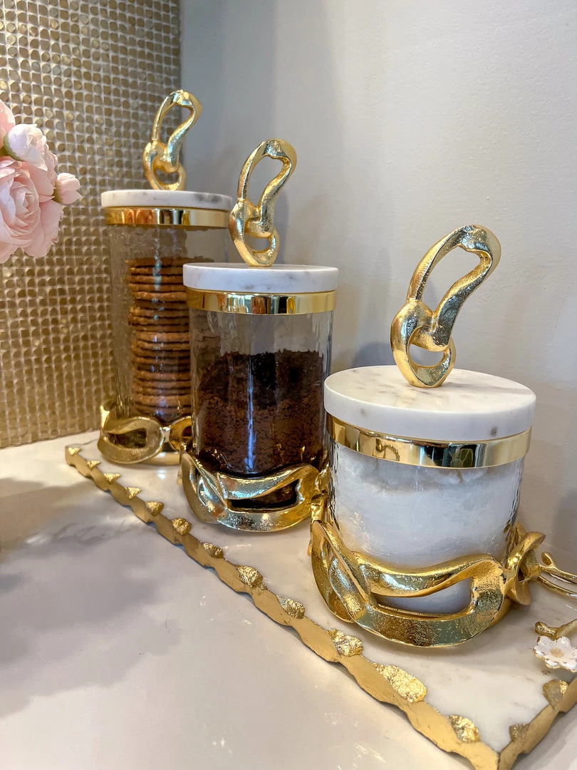 Inspire Me! Home Decor Glass Canisters With Gold Knot Design And Marble Lid (3 Sizes) 6 Inspire Me! Home Decor Glass Canisters With Gold Knot Design And Marble Lid (3 Sizes)