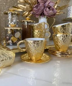 Inspire Me! Home Decor Gold Textured Metal Tea Cup And Saucer With White Interior